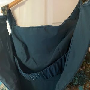 Dress, heels, and jewelry complete outfit